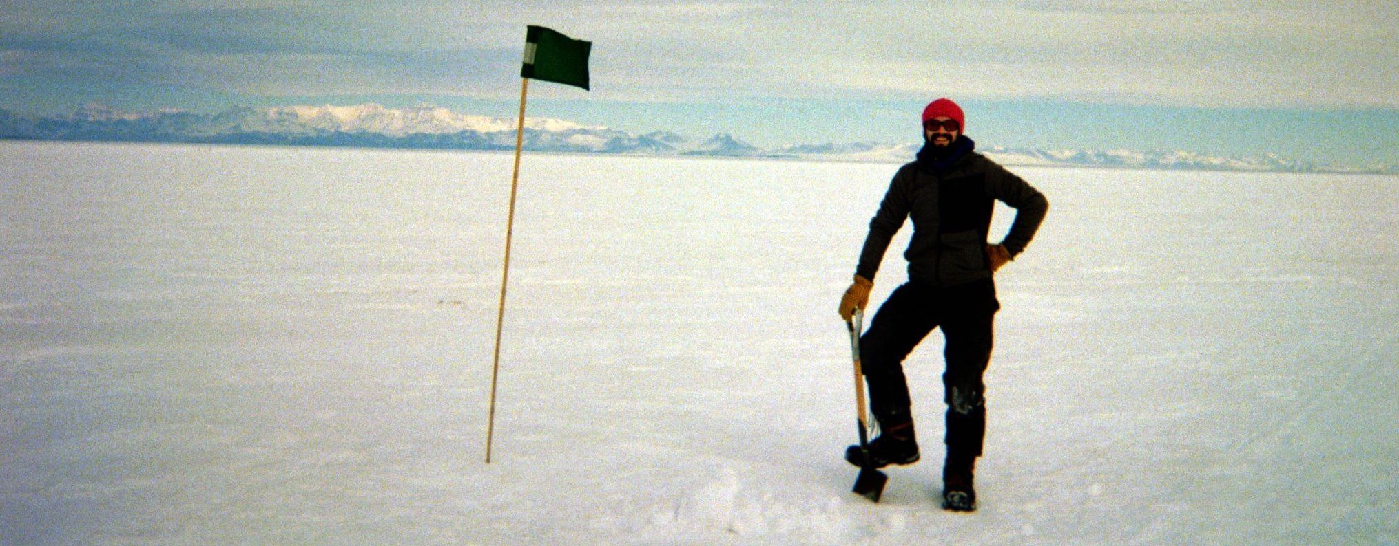 Paul digs a small hole on McMurdo Ice Shelf