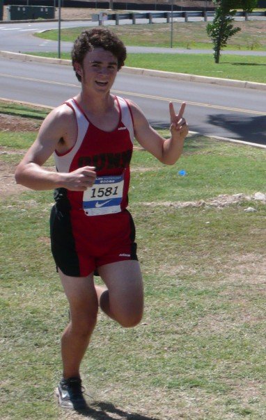 Paul running cross country in high school