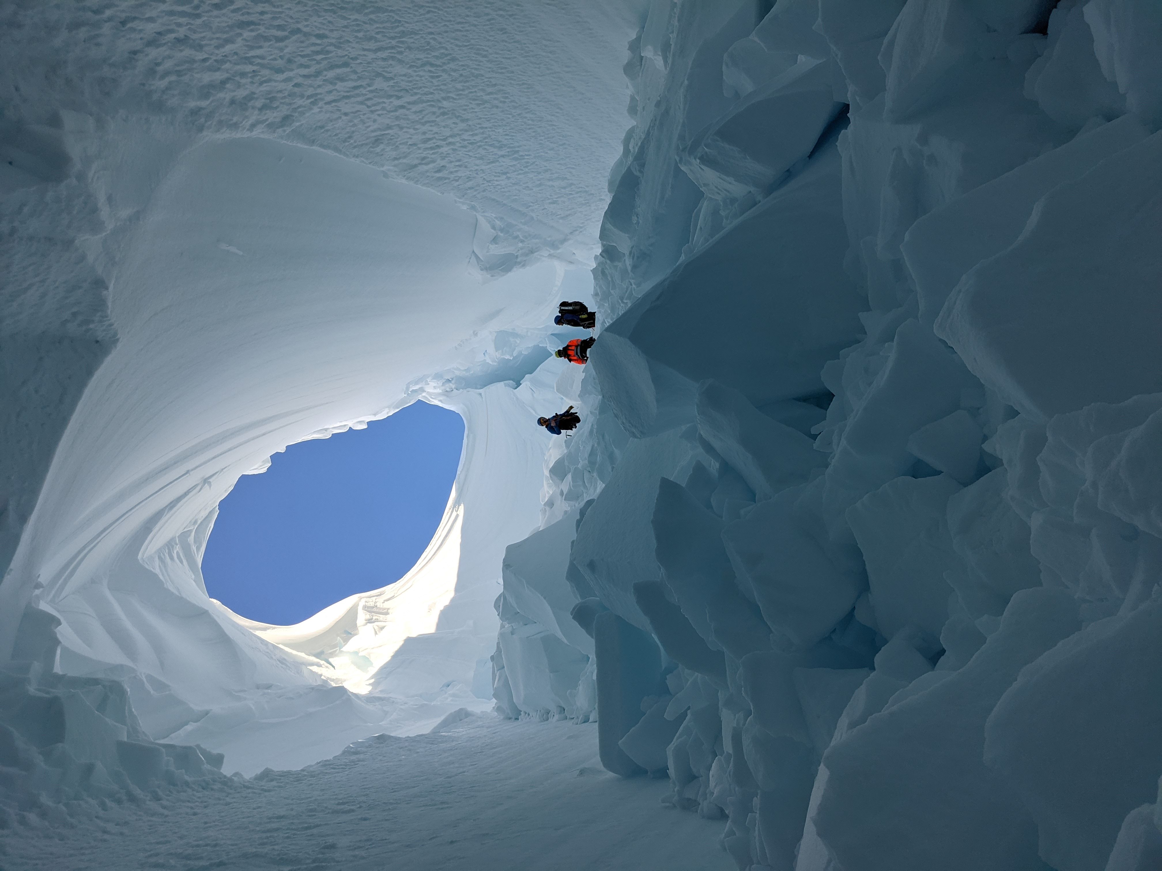 Looking up at a skylight in the ice cave