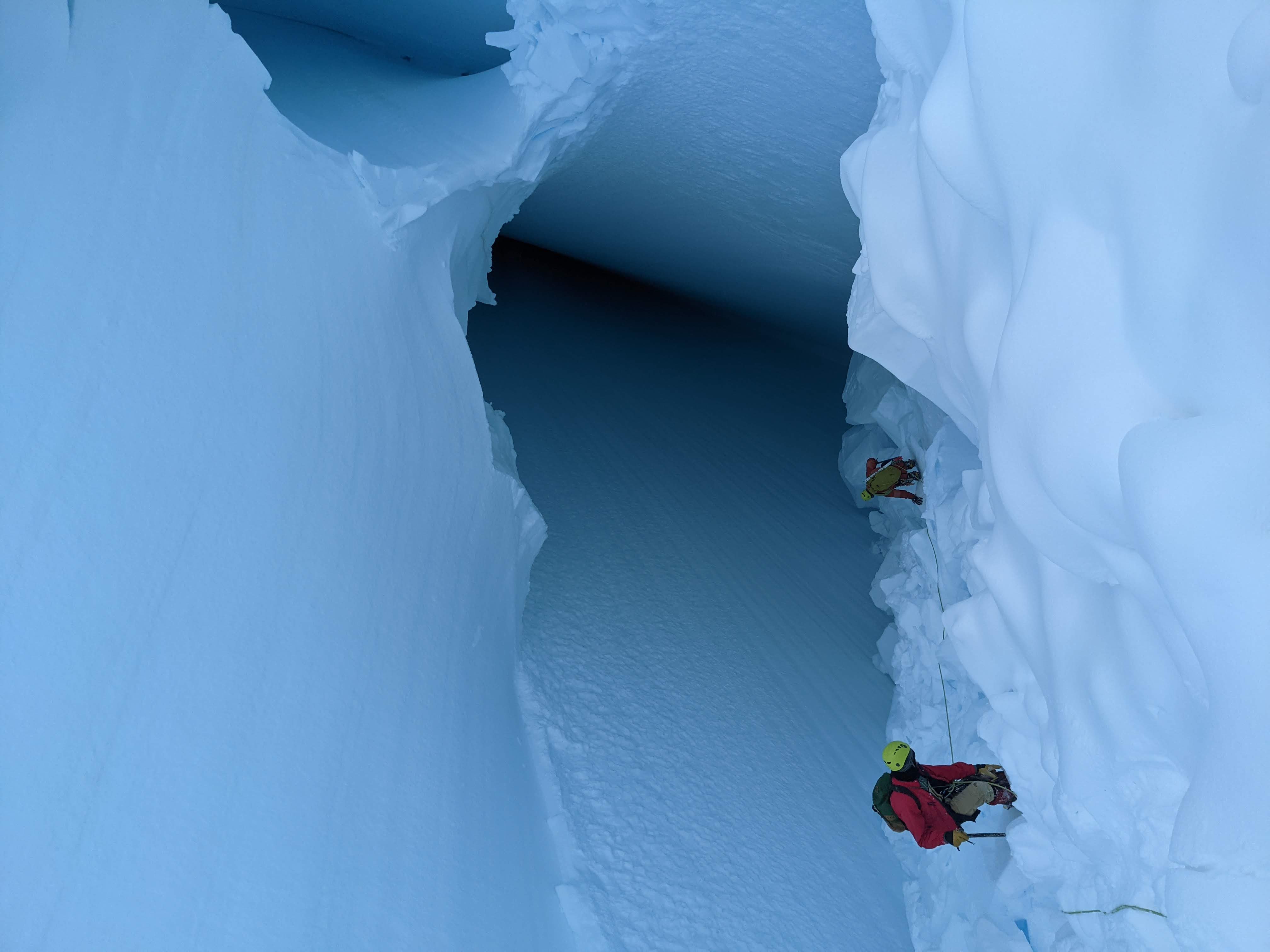 Descending down into the bottom of the crevasse