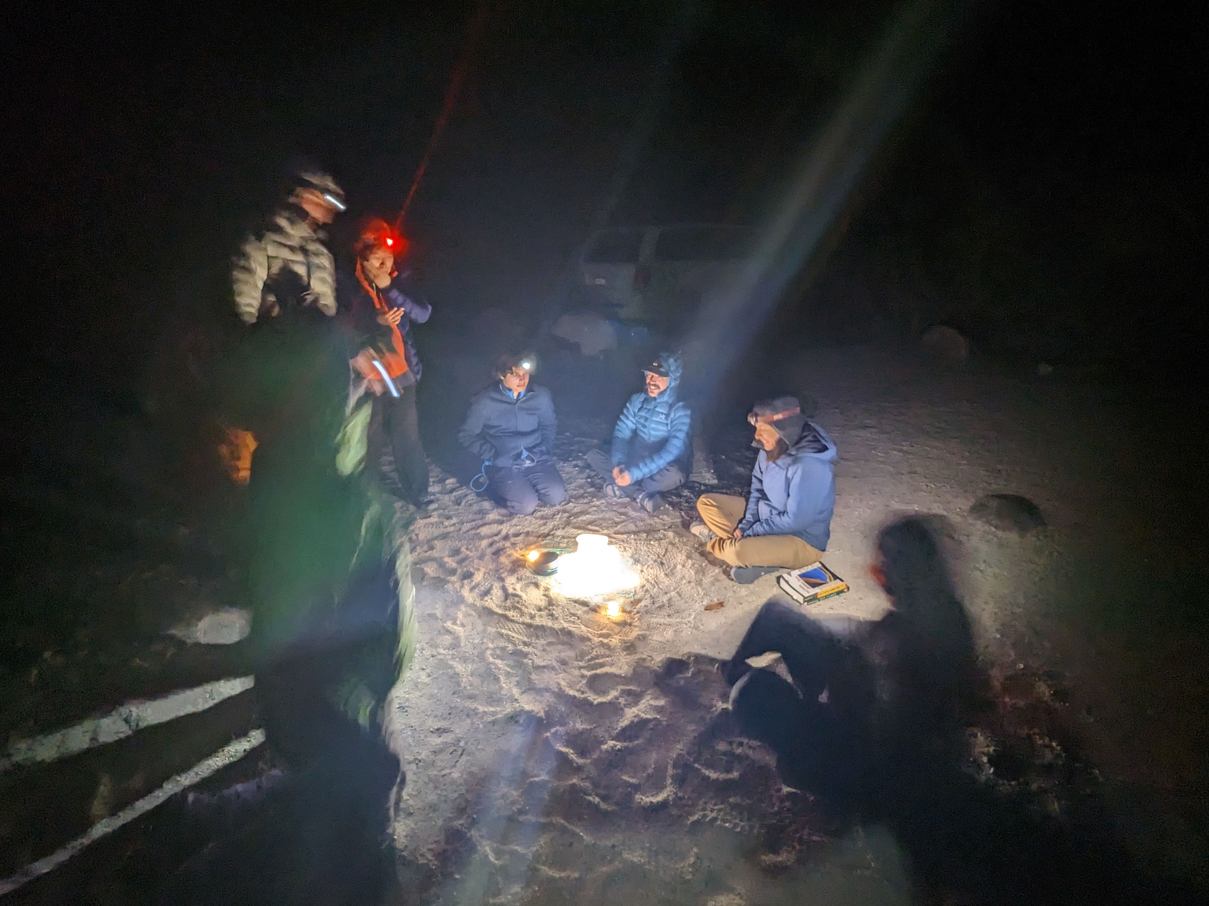 Class discussion around the makeshift campfire