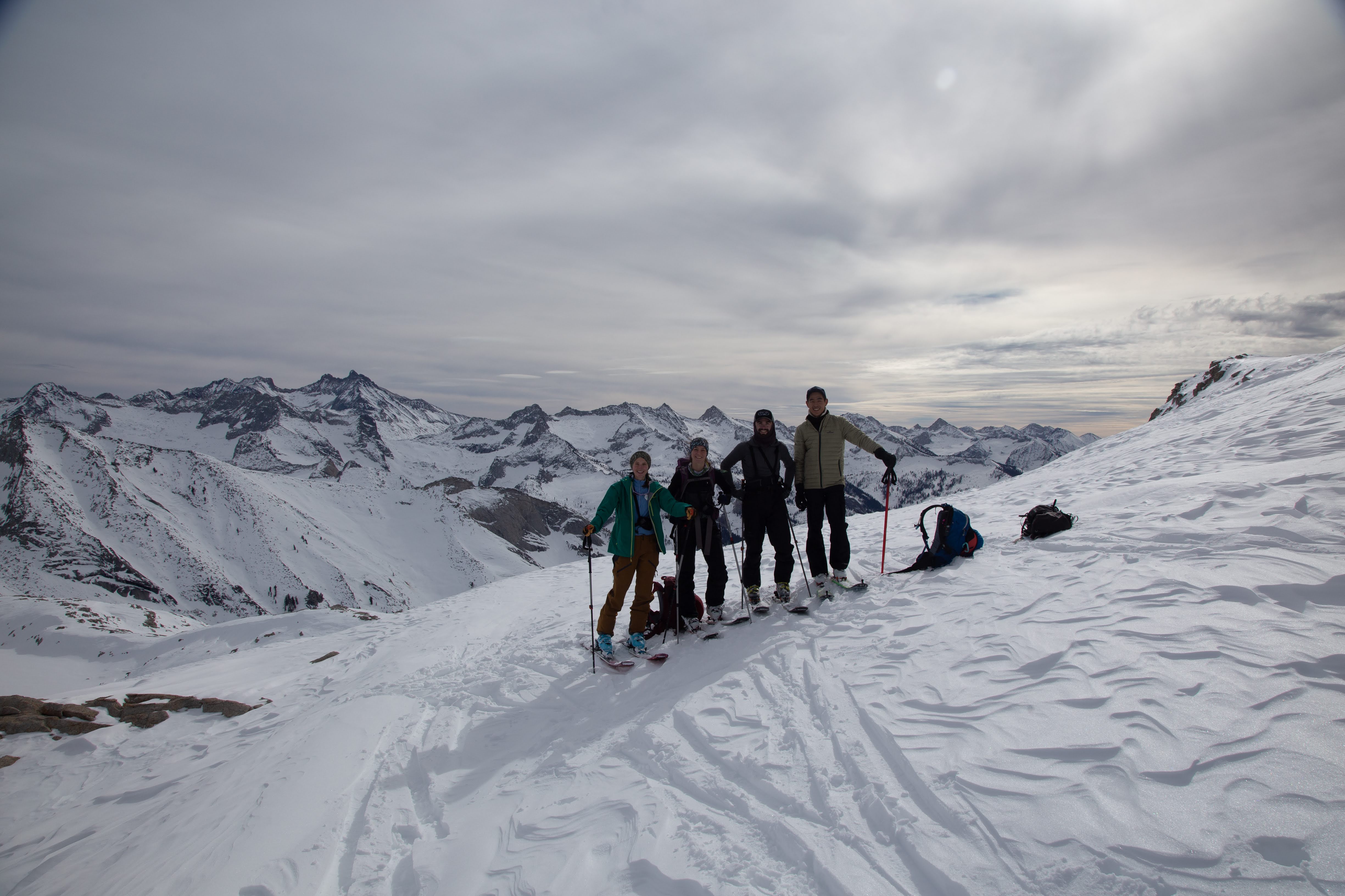 The group poses for a photo on the ridgeline