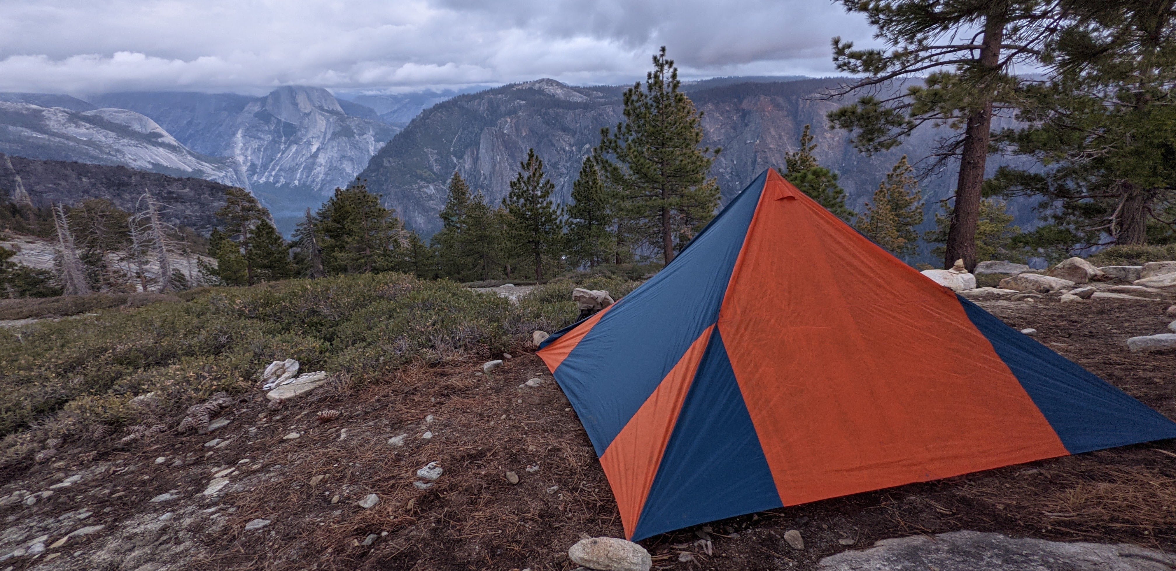 Pyramid tent with Half Dome in the distance